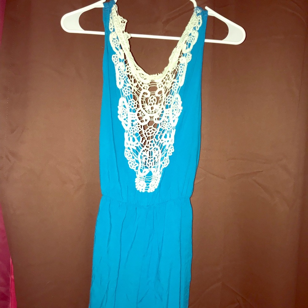 Romper with low cut front and macrame design